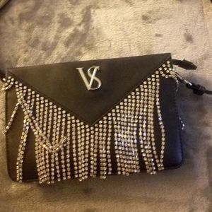 Lots of bling! Victoria secret crossbody. Used a couple of times. Very pretty!